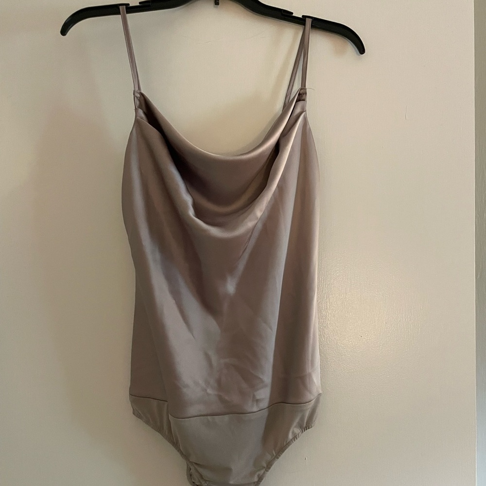 Brand is Dress Forum. Size medium. Champagne color.